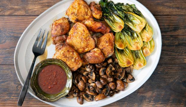 Natural Grocers Sweet and Spicy Korean Roasted Chicken Thighs Served with Mushrooms and Bok Choy | Natural Grocers
